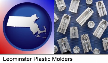 several plastic molds, made from machined metal in Leominster, MA